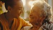© buraratn - Professional helpful caregiver comforting smiling senior woman at nursing home