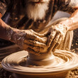 A close-up of a potter shaping clay on a spinning wheel