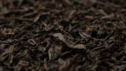 Wall Mural - Sprinkle dried black tea leaves, slider shot