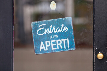 Wall Mural - Italian open sign in a window