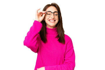 Wall Mural - Young caucasian woman over isolated chroma key background with glasses and happy