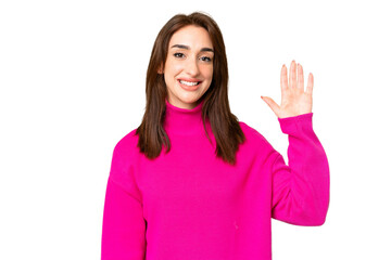 Wall Mural - Young caucasian woman over isolated chroma key background saluting with hand with happy expression