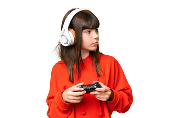 Poster - Little caucasian girl playing with a video game controller over isolated background looking to the side