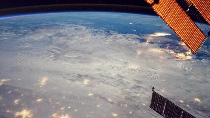 Wall Mural - blue planet earth seen from space. space station orbiting around earth. visible sky and atmosphere. 