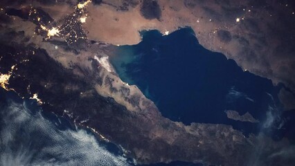 Wall Mural - earth surface seen from space: land and clouds. view from international space station. public domain