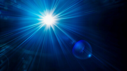 Wall Mural - Blue lens flare on a black background, glowing light overlay