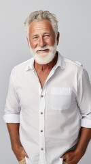 Poster - Stock image of a grandpa in a relaxed outfit on a white backdrop Generative AI