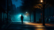 A lone figure traverses a fog-enshrouded street at night, embodying deep solitude and contemplation. This urban scene, bathed in mystery and calm, invites introspective journeys and quiet reflection.