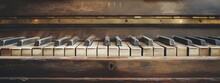 A Close Up Of A Piano With A Wooden Case