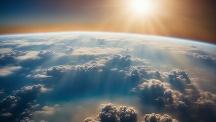 Wall Mural - sunrise above the clouds A beautiful view of a Earth from space, with a blue sunrise over the atmosphere.  