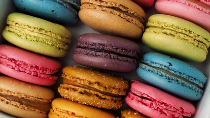 Wall Mural - Rotating Colorful French Macaroons. French macaroons close-up.