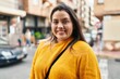 © Krakenimages.com - Young beautiful plus size woman smiling confident standing at street