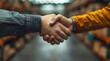 © Gonzalo - Two people shaking hands