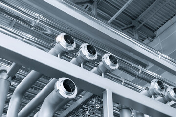 Poster - Stainless steel pipes in food or pharmaceutical or chemical industrial factory, industrial concept background