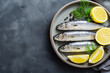 Fresh sardines with lemon and salt