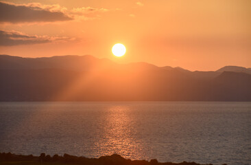 Wall Mural - the sun sets behind the mountains in winter in Cyprus 7