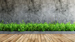 Lush green plants line the base of a modern concrete gray wall atop wooden floors. Ecology natural fresh background, backdrop, copy space.