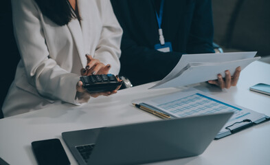 Co working conference, Business team meeting present, investor colleagues discussing new plan financial graph data on office table with laptop and digital tablet, Finance, accounting, investment.