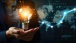 © ANEK - great creative brainstorming business idea of glowing light bulb in hand.