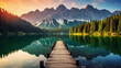 Calm morning view of Fusine lake. Colorful summer concept of an ideal resting place. Creative image.