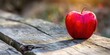 red apple on a wooden background