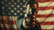A man holding a gun in front of an American flag, symbolizing potential danger. Concept of the problem of gun laws in the USA, crime. Copy space.