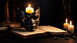 World theater day. Dark still life with theatrical elements: A mask in front of a large book with a lit candle.