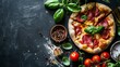 Pepperoni Pizza with Mozzarella cheese, salami,  Fresh Basil. Italian pizza. On gray slate background decorated with fresh ingredients. Delicious fast food. Copy space.