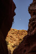 red rock canyon gran canaria barranco de las vacas spain moon in the blue sky stone framing 