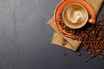 Wall Mural - Roasted coffee beans and espresso coffee cup