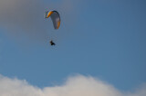 Fototapeta Uliczki - Parachute gliding up and away