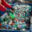© Uros - illustration of an anonymous person in a red sleeve recycling a green plastic bottle, placing it into a blue bin filled with assorted recyclables