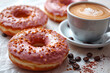 Coffee and very tasty donuts. Eating donuts and coffee may symbolize peace and happiness for humans.