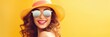 beautiful girl in a summer hat and sunglasses on a yellow background. summer concept. banner.