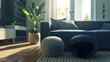 Modern living room. Two knitted pouffes near a dark blue corner sofa. Scandinavian home interior design modern living room