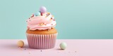 Fototapeta Tulipany - Easter cupcake with icing and Easter eggs on pastel pink and blue background. Greeting card. Banner. Copy space. Easter celebrations.