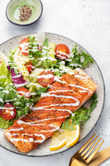 Wall Mural - Grilled salmon and fresh salad