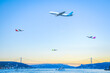 Passenger planes flying over the Bosphorus of Istanbul.