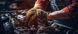Fototapeta  - Skilled Mechanic Engages in Precision Work to Repair Car Engine with Various Tools