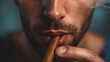 Closeup of a Man Holding a Cigar in His Lips.