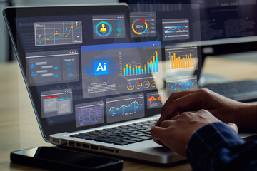 ai (artificial intelligence). businessman working on laptop connect to technology ai for working too