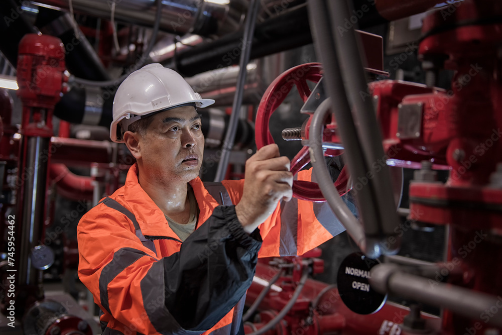 Engineer check generator pump for water sprinkler piping and fire ...
