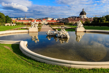 Wall Mural - Fountain sculptures in Belvedere Gardens with Lower Belvedere in Vienna, Austria