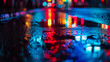 Multi-colored neon lights in a puddle on a dark city street, reflection of neon color. Night city. Abstract night background.