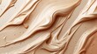 Close-up image of makeup foundation smeared to showcase different shades and textures of cosmetic products