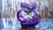 Reflections of Time, Purple Hourglass with Ashes Flowing, Symbolizing the Passage of Time and Contemplation