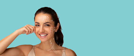 beautiful young woman with clean fresh skin touching her chin