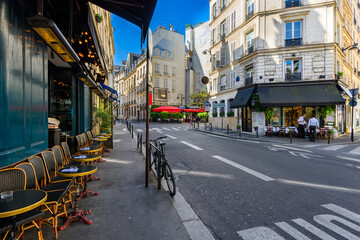 Wall Mural - cozy street with tables of cafe in paris, france. cityscape of paris. architecture and landmarks of 