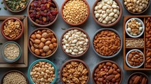  A Table Topped With Bowls Filled With Lots Of Different Types Of Nuts And Nuts On Top Of A Table Next To Bowls Filled With Different Types Of Nuts And Varieties Of Nuts.