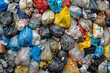 Assorted plastic bags and waste piled in environmental chaos